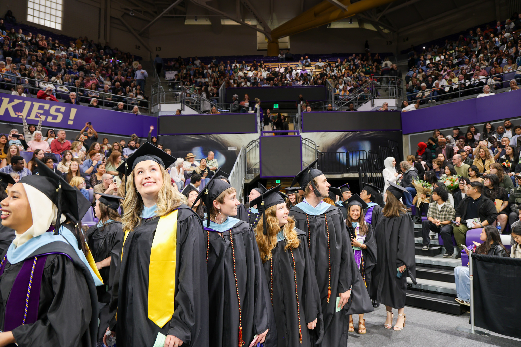 students processing into graduation