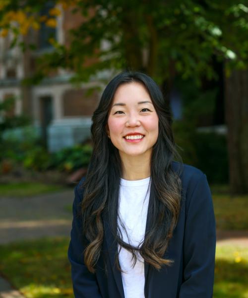 Headshot of Candis Eckert on the University of Washington campus.