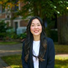 Headshot of Candis Eckert on the University of Washington campus.